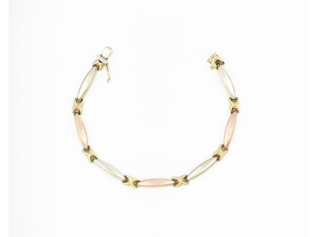 Zlatý náramek, v kombinaci červeného a bílého zlata.