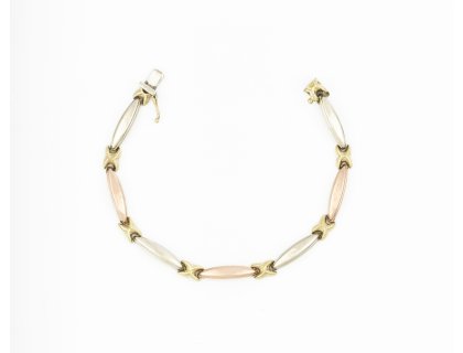 Zlatý náramek, v kombinaci červeného a bílého zlata.