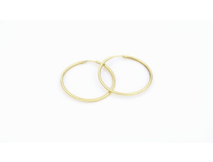 Zlaté náušnice, kruhy.